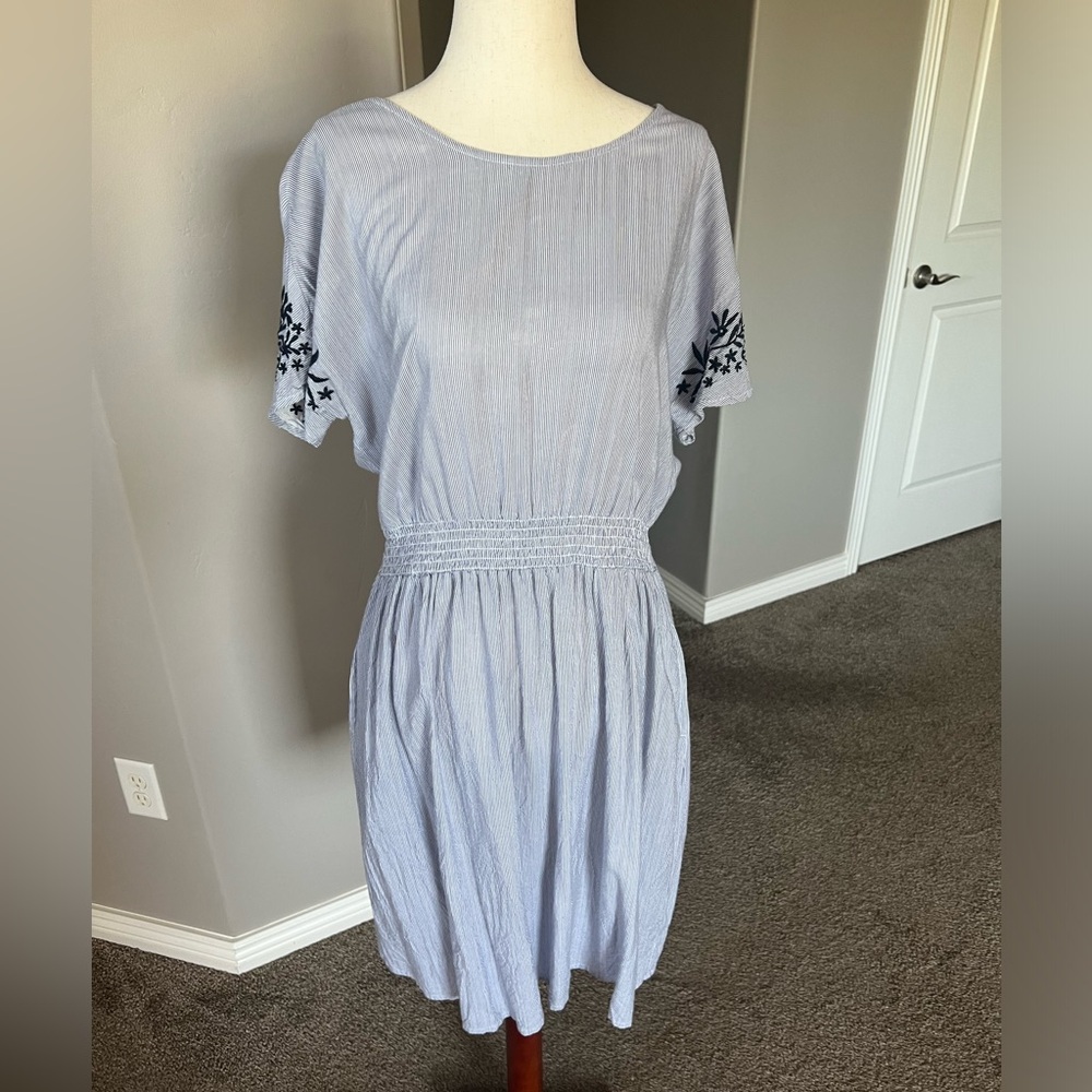 DownEast dress with beautiful stitching and pockets.